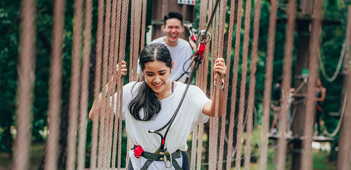 Friends taking part in the zipline and high element activities at Forest Adventure Singapore