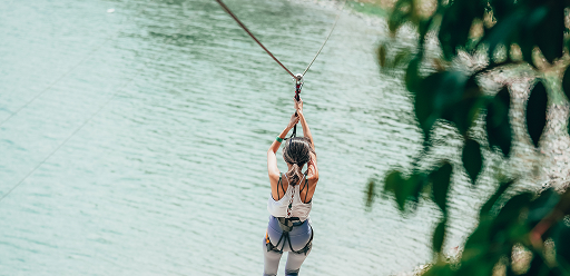 Thrilling flying fox zipline ride over Bedok Reservoir at Forest Adventure Singapore